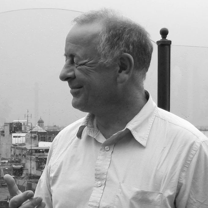 A laughing Mark Barratt on a rooftop at ATypI 2009 in Mexico City.