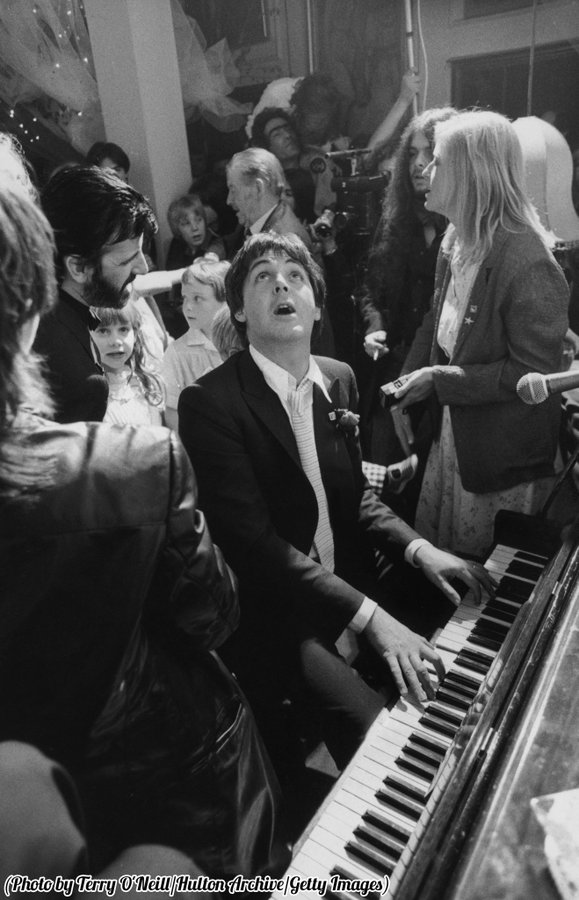 Paul McCartney playing piano at the wedding reception of Ringo Starr and Barbara Bach, 1981.
