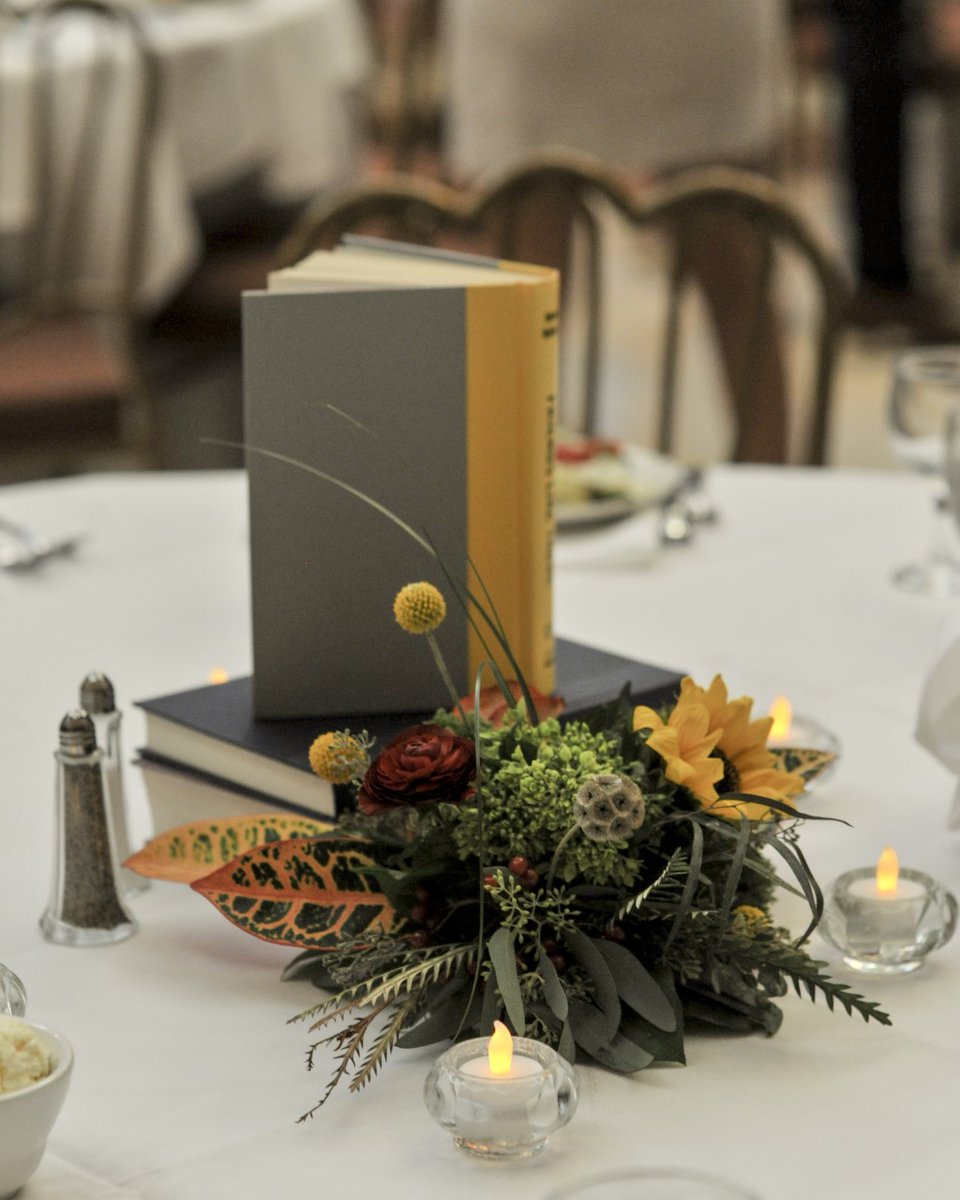 ALPLM's tweet photo. Happy Sunday from the #ALPLMVenue rental staff. This wedding reception client used books as part of their dinner table decorations, which match with the reception venue of the ALPLM perfectly. Photo by Apartment C Photography #Librarytheme #WRW https://t.co/AZNDqMfHsW