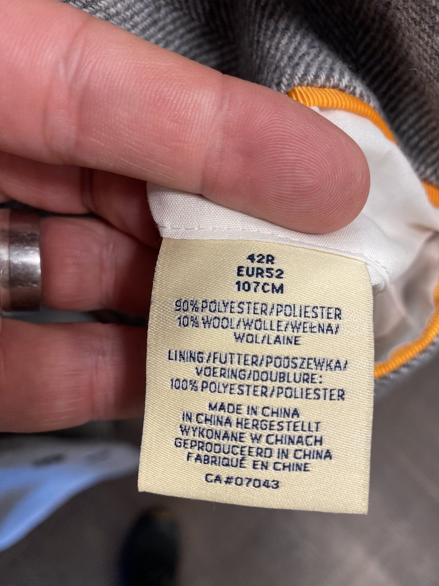 Drives me crackers. From the “British heritage” to the “Made in China” label. From the “Luxury Wool Blend” to the 90% Polyester, 10% wool content.