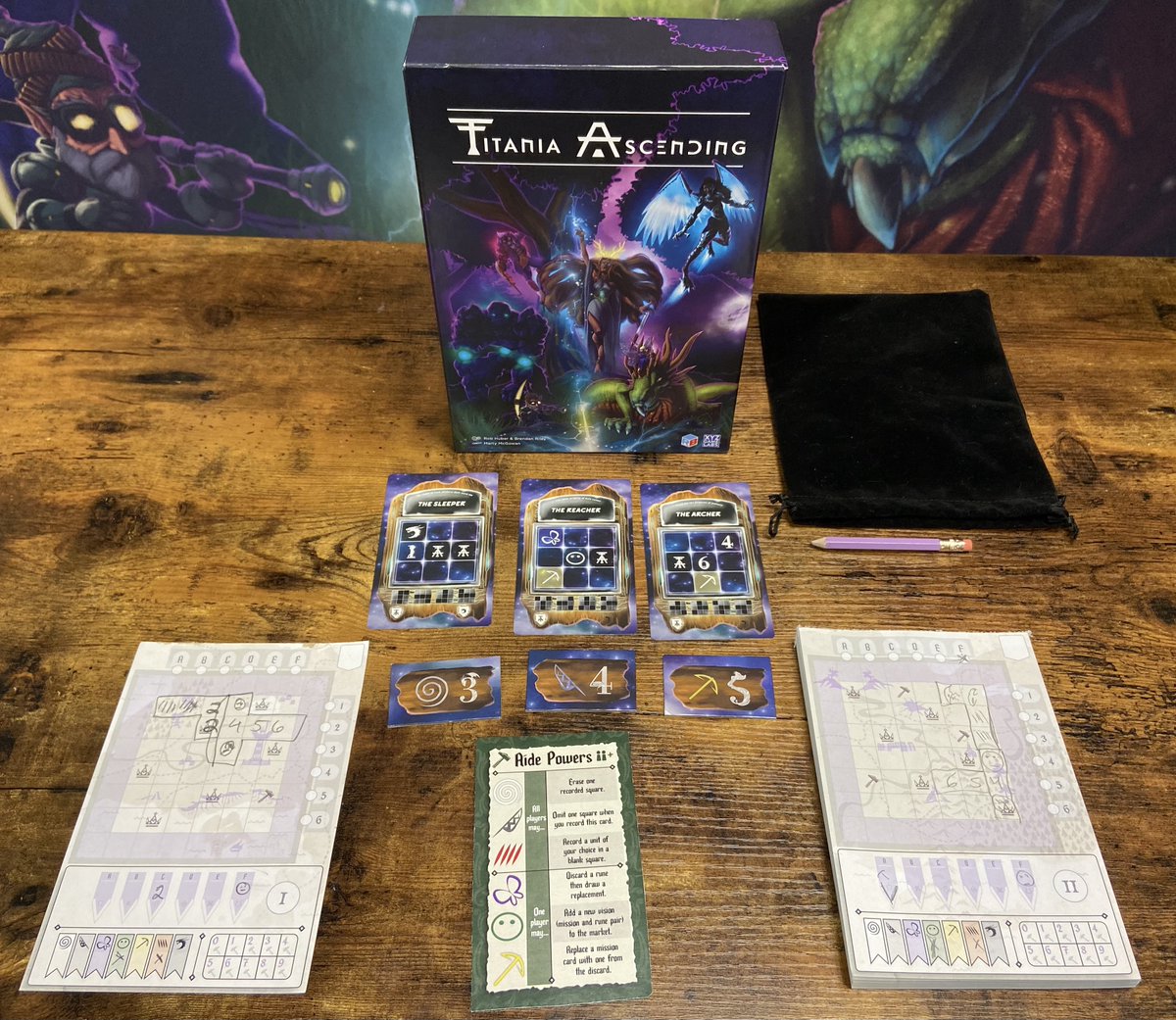 BoardGameGeek's tweet photo. Titania Ascending from @xyzgamelabs is a co-operative flip-and-write game for 1-6 players in which you build individual realms in the first half of the game, which sets up boons, bonuses, &amp; the victory conditions for the second half of the game when you black out the grid. —WEM https://t.co/UvhDuXmXtb