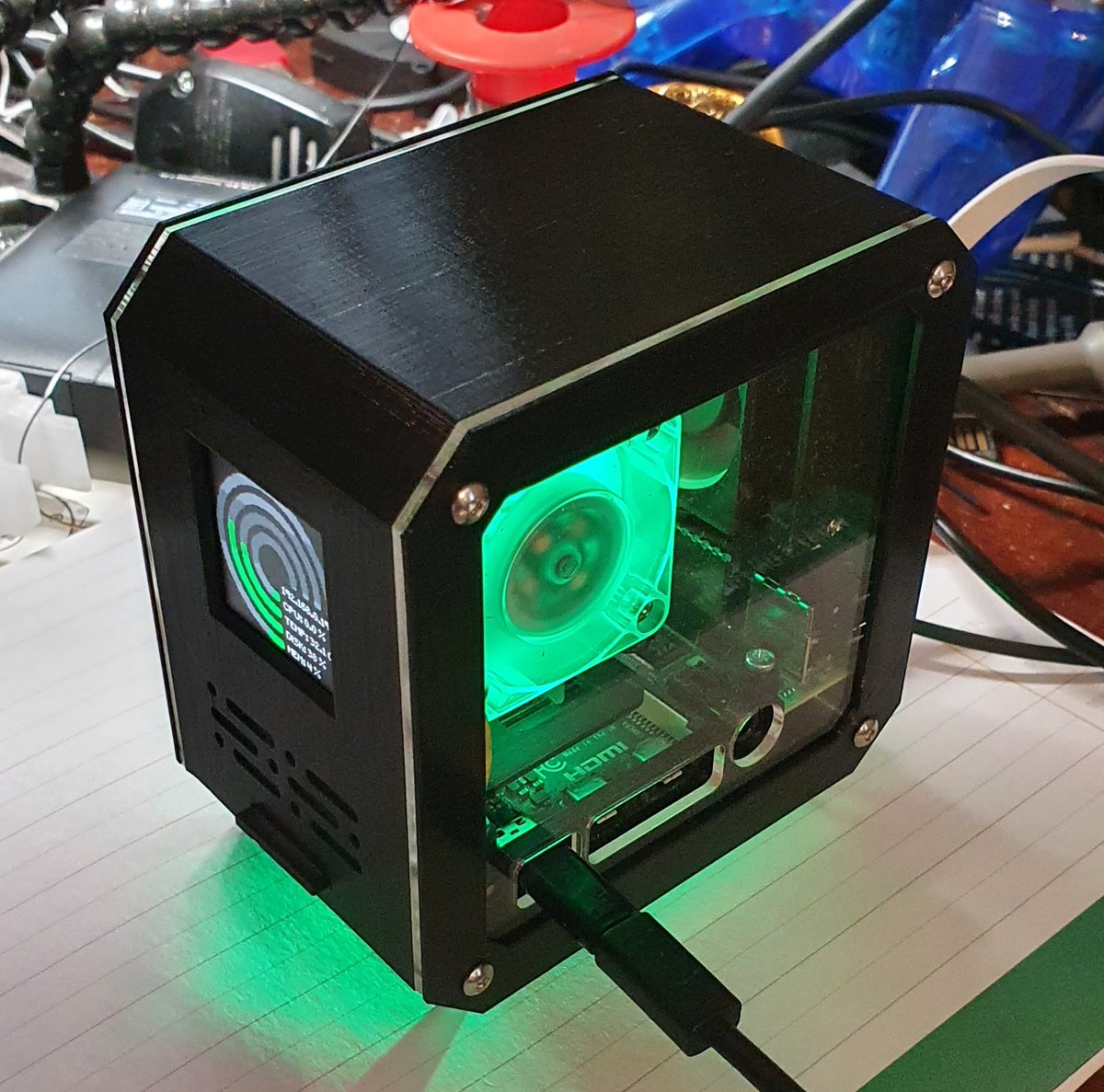 turbopi's tweet image. We have just finished a custom case for the @Raspberry_Pi 4 . This time we made the fan &amp;amp; cooler illuminate green and added an under case green LED. Note the Noctua case fan is shrouded in black to keep the black aesthetic. Hope the customer likes it! #raspberrypicase #rpi