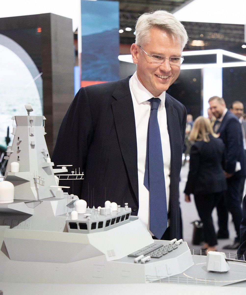 Posting this against my better judgement but anyone who went to #DSEI21 last week know this gentleman?

Looking thru the event on my feed and that smile at the little model ship absolutely melted me 😭 long shot but ay