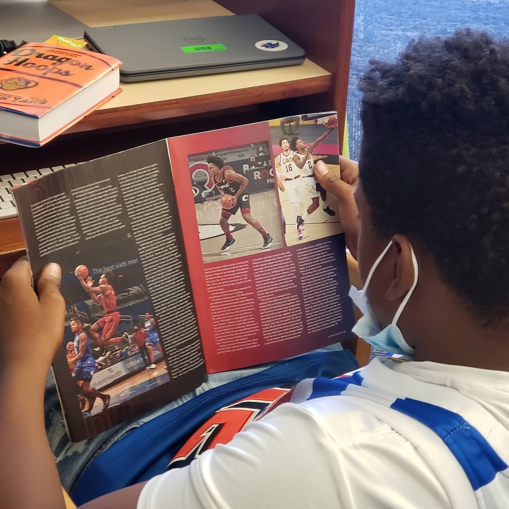 Hard to fuss at a student who is reading during our lessons in the library.  Dont tell Mrs. Todd, but I usually let them read on!. :) 
P.S. we have magazines for check out. Terrence is reading SLAM, a basketball magazine. 

#LorisLionsRead 
#hcslibraryme… instagr.am/p/CUBSnvEsP5t/