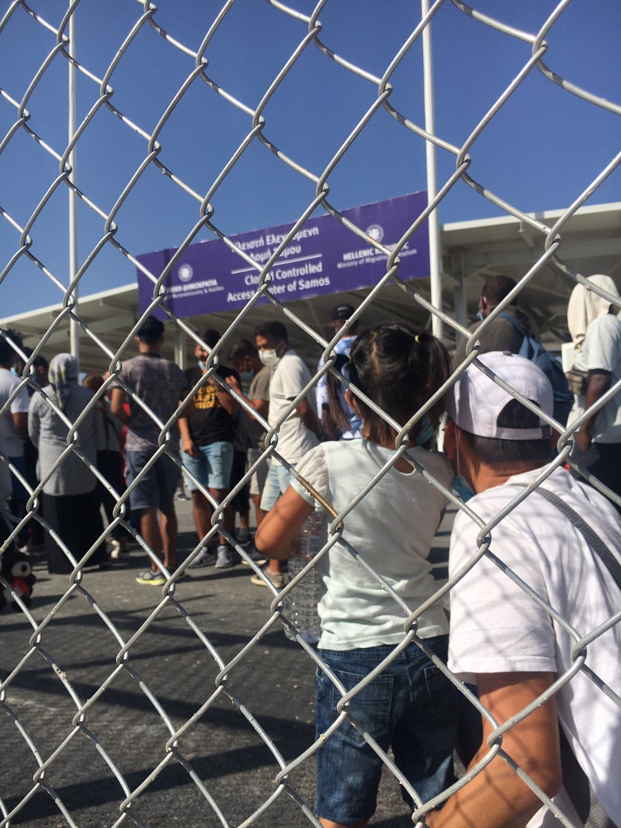 “I lied to her,” says this father from Afghanistan as he waits to enter new camp in Samos with his 4 year old daughter, “I told her we were going to Athens - it’s like a prison,” he says looking at the camp.