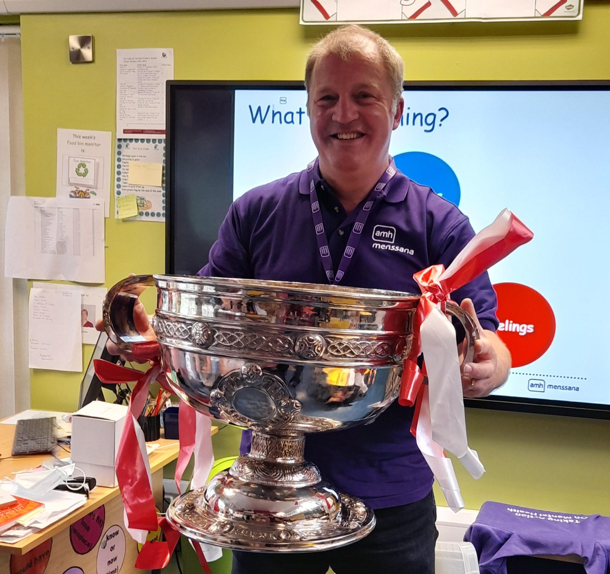Michael from AMH MensSana was delivering Healthy Me to the P5 class at Our Lady of Lourdes Primary School @GreencastlePS when they had a surprise visitor - The Sam Maguire! Many thanks to @TyroneGAALive All Ireland Senior Football Champions!!