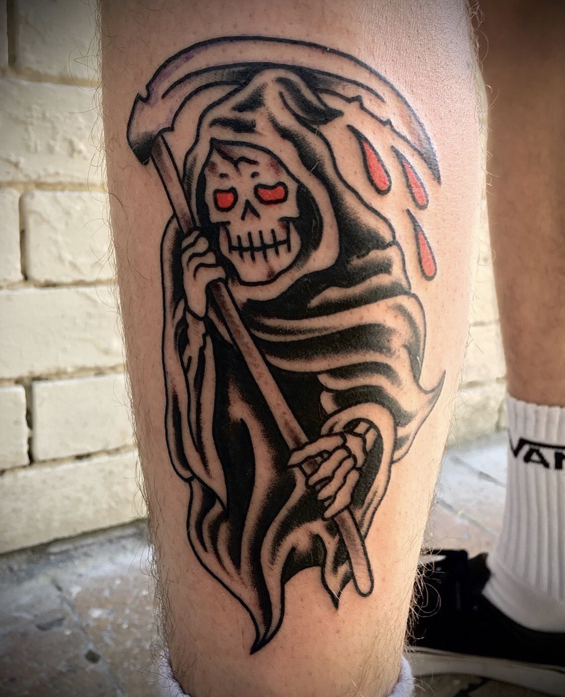 Premium Vector  Grim reaper emblem in traditional tattoo style