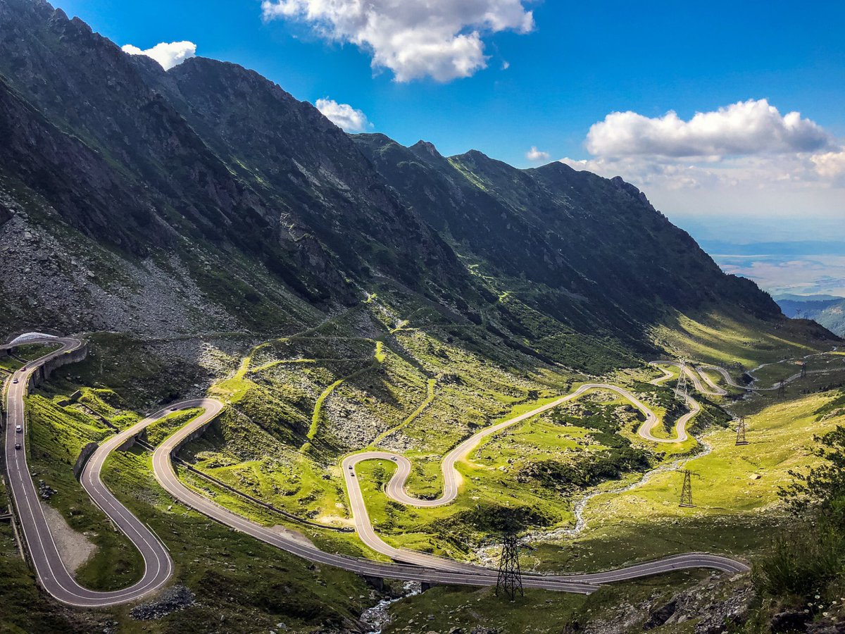 #OnThisDay, 47 years ago, one of the most impressive and adventurous roads in Europe, Transfăgărășan, was inaugurated. Connecting RO historical provinces Muntenia &amp; Transylvania, it crosses the highest mountain range in 🇷🇴, Făgăraș Mountains, at over 2,000 meters altitude.🚗🏍🚵