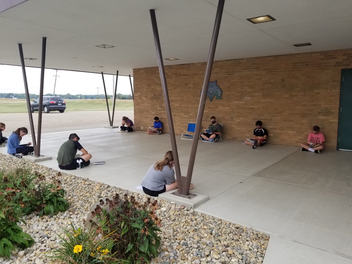 MrsATower's tweet image. 7th Grade is enjoying Silent Sustained Reading time outside!#twolves7pride