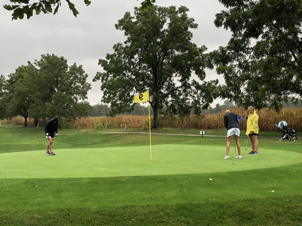 New_Pal_Golf's tweet photo. Golf is tough enough…today is tough x10. A steady rain and breeze from the south make for trying conditions. These girls are true warriors today! #ihsaasectional #WeAreDragons @NPHSDragons @VoelzJames https://t.co/rSCK1jJeBO