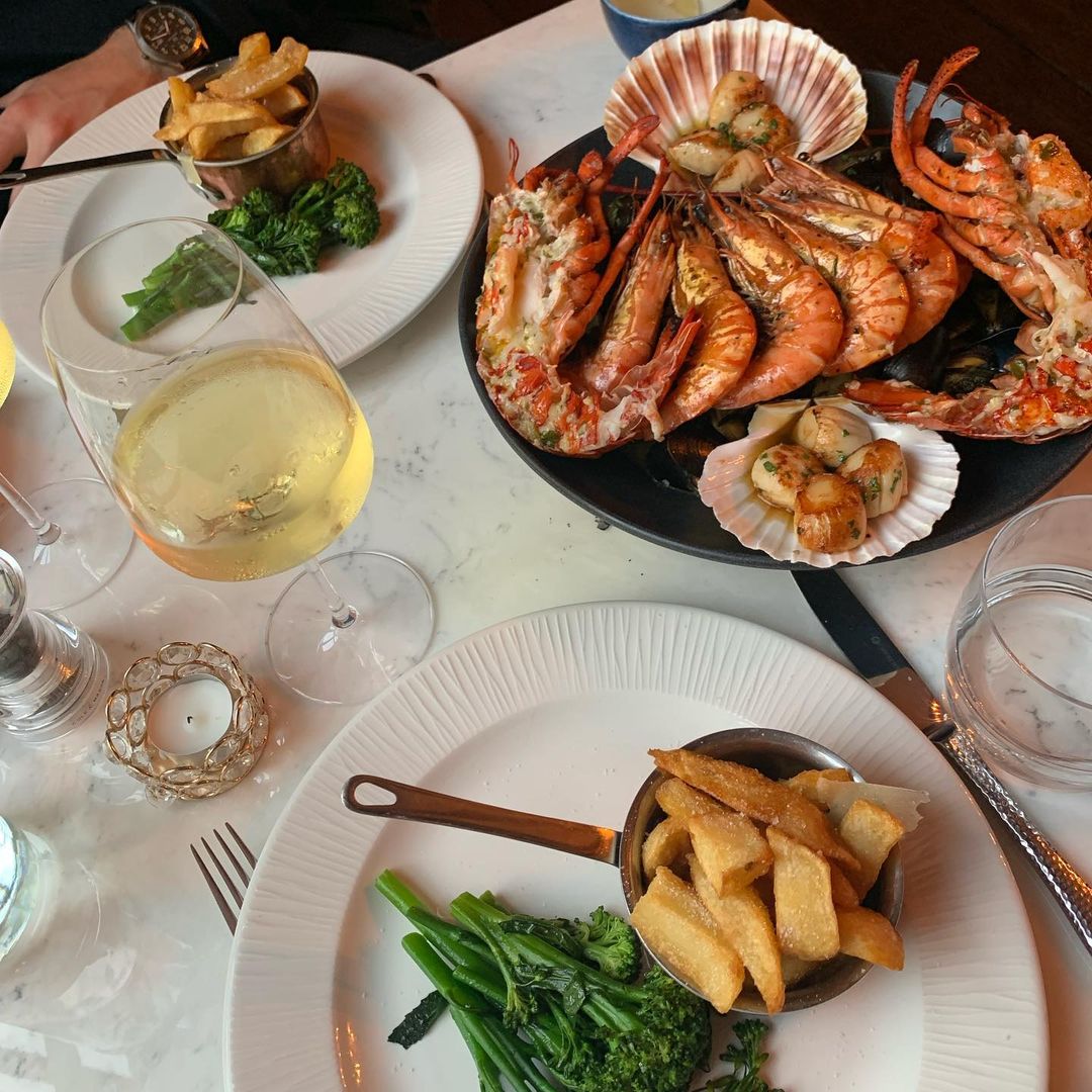 ChurchesMansion's tweet photo. Say hello to our (locally) famous seafood platter – the pièce de resistance of our seafood menu at the Mansion.

A beautiful selection of buttery lobster, langoustines and scallops served with seasonal green veg and our extra crispy hand-cut chips.

📷: tabitha_holden on Insta https://t.co/Xw7UMgFmeJ