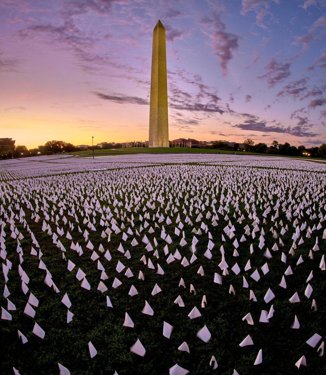 Out on the wire. <a href="/ZUMApress/">ZUMA Press</a> -- In DC for the first time in a long time and wandered over to The National Mall. The over 600,000 flags representing those lost to COVID are stunning in their power and tragedy. So much loss.