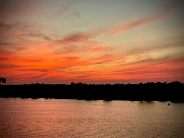 After a summer full of spectacular sunsets, this one may take the cake. I took these shots just minutes apart Sunday.