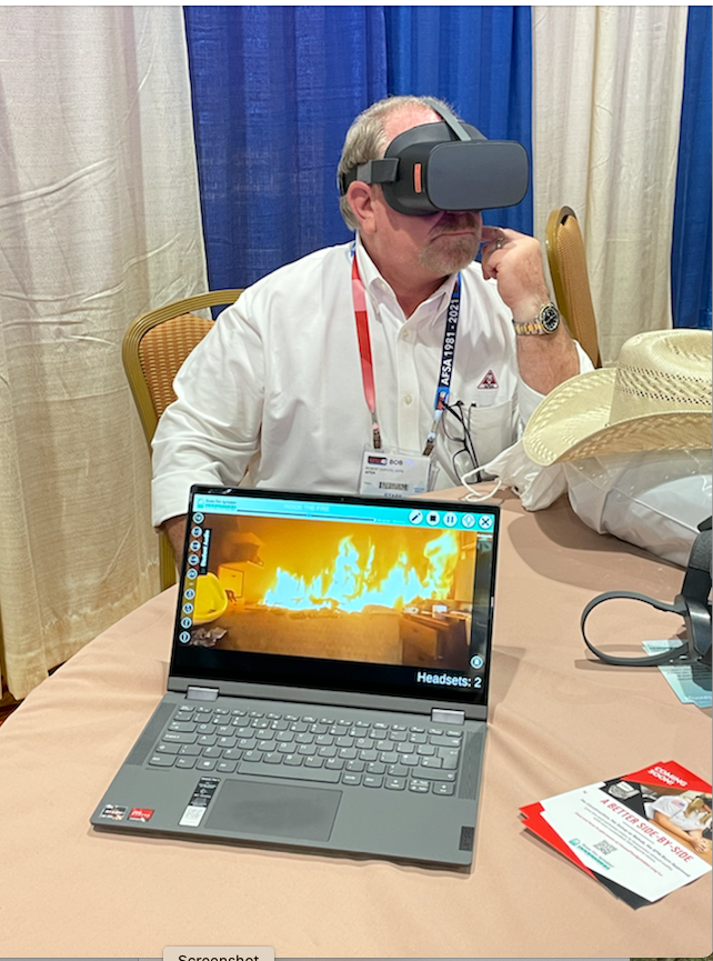 HFSCorg's tweet photo. Bob Caputo, president of @AFSA, experienced HFSC's new Virtual Reality education at #AFSA40. If you're there, stop by HFSC's booth and check it out. #abettersidebyside https://t.co/vg02Acm7v9