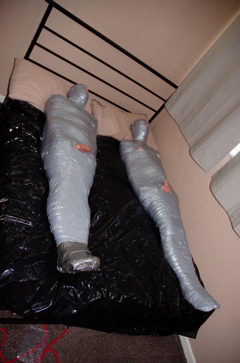 gear_bondage's tweet photo. Was just chatting to someone who said they'd like to experience being mummified next to another guy, which reminded me of when @PupLorcan and I were mummified by @brizzle1973. That was a very fun session! https://t.co/bvBOtq3iUP