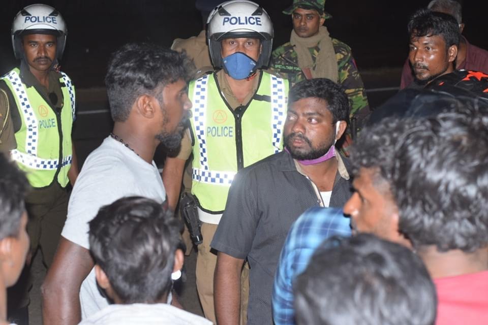 TamilGuardian's tweet photo. UPDATE - Tamil man shot dead by Sri Lankan army soldiers named as 24-year-old Thiraviyam Ramalingham

He was taken to Palai Hospital with a doctor not brought to treat him for 45 minutes.

Locals are protesting outside the hospital &amp; on the A9 highway.

https://t.co/iC04mU4DPJ https://t.co/PZth4I7xaE