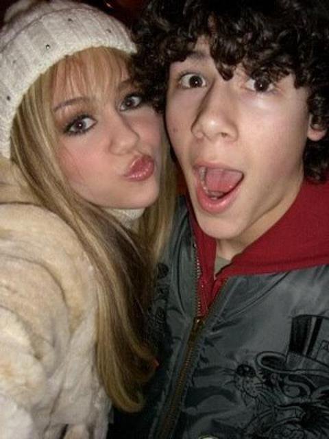 November 23, 2006: Miley Cyrus and the Jonas Brothers both performed during the Macy’s Thanksgiving Day parade. Nick and Miley spent her 14th birthday together in New York City.