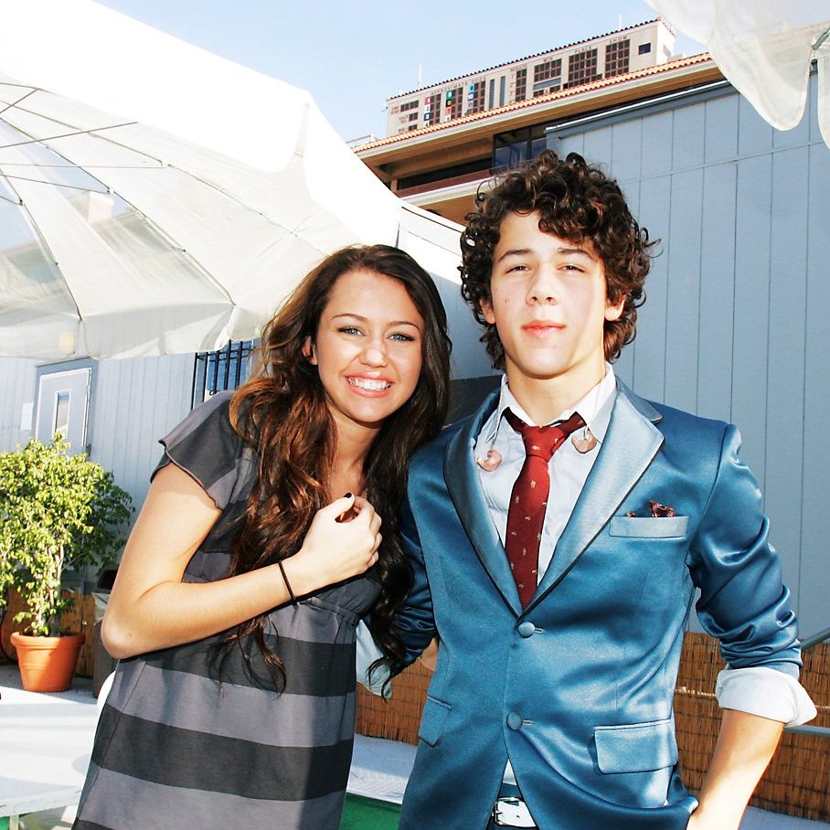 June 30, 2007: Miley Cyrus appeared as a special guest to introduce the Jonas Brothers at their concert at the San Diego County Fair. She was photographed kissing Nick backstage.