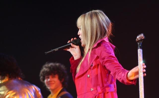 November 12, 2007: Nick and Miley making each other smile during their concert in San Antonio