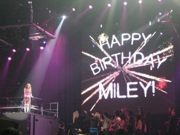 November 23, 2007: Miley celebrated her 15th birthday on stage during a concert in Nashville, TN. The flowers she was given on stage were a gift from the Jonas Brothers, and Nick also gave her a passport holder and a bracelet.