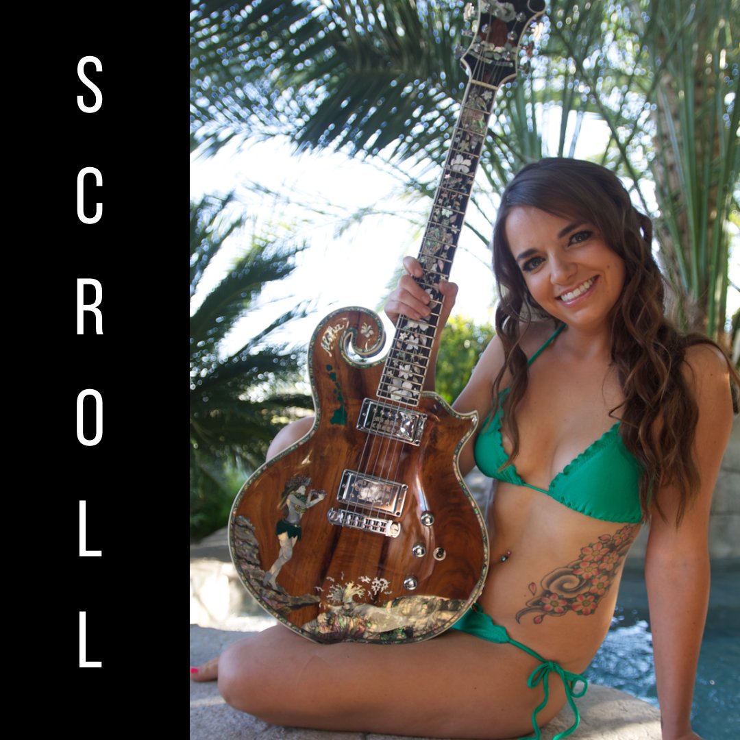 Pretty girls and pretty guitars go together - just ask Lacie!  As pretty guitars go, made of Koa and with killer Hawaiian inlays, this Scroll is at the top of the heap!!!  Check it out on Amazon - she could be yours (the guitar, not the girl) :)

amazon.com/dp/B07P8NPPGH