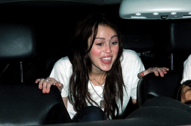 Over the next month or so, Miley was photographed wearing Nick’s dogtag necklace in public multiple times while hanging out with friends and on her way to the recording studio [February 2008]