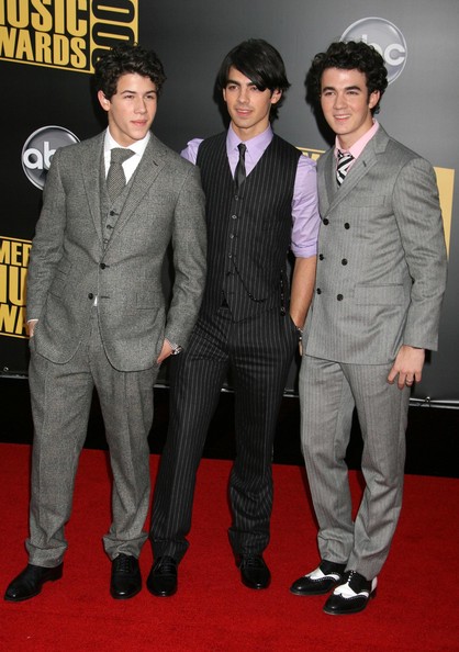 November 23, 2008: Miley Cyrus and the Jonas Brothers both attended the American Music Awards.