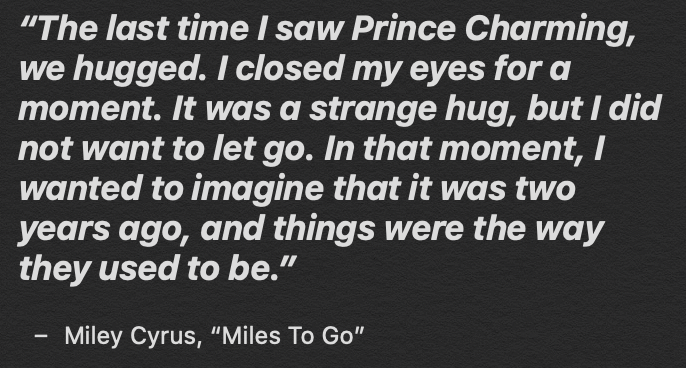Nick and Miley hugged on stage during the Kids' Inaugural Concert - which Miley later wrote about in her book "Miles To Go"