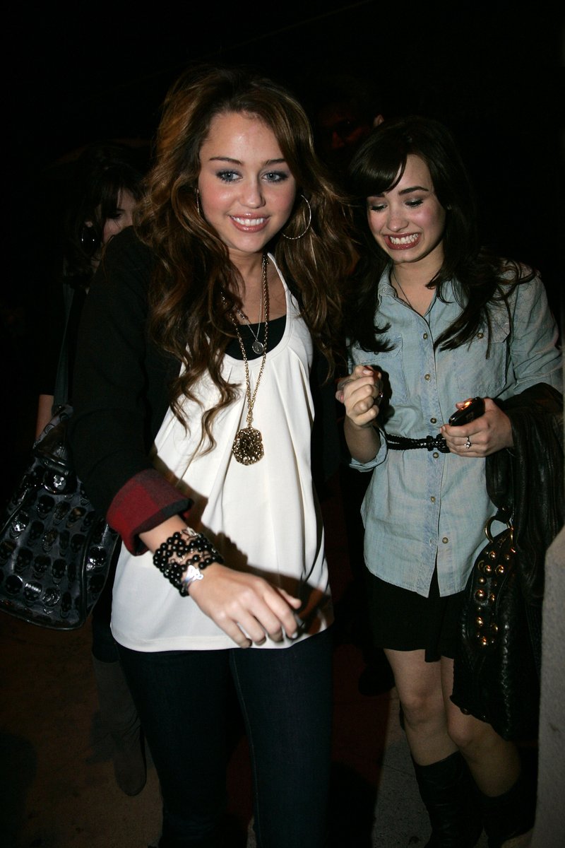February 12, 2009: Miley Cyrus went out to dinner with Selena Gomez, Demi Lovato, and Justin Gaston