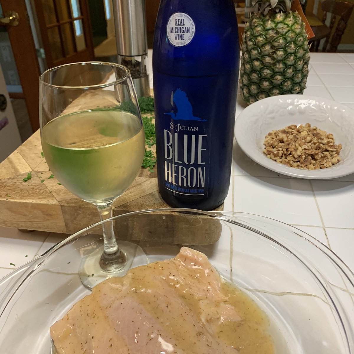 scochrane's tweet image. Getting ready to grill some Lake Michigan king salmon accompanied by a refreshing glass of Blue Heron white wine from @stjulianwinery. It is perfect on this hot June evening. #Wine #Grilling #MichiganSummer #NoFilter #NoMakeup #Twoast