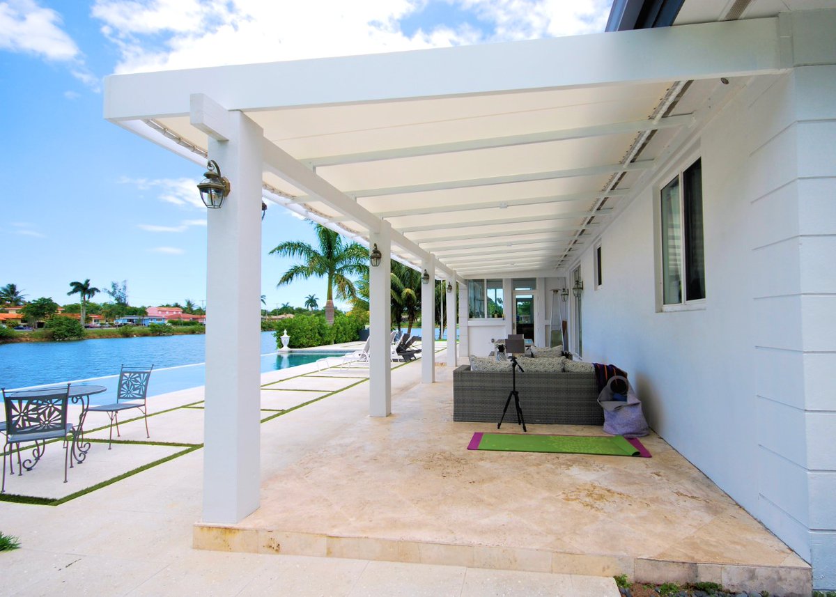 MiamiAwningCo's tweet photo. Architectural modern canopies give every outdoor living space a fresh, elegant look. Our client is now able to use their patio space all-year-round, rain, or shine. Let us design and customize a canopy for you! Contact us at 305-576-2029! 
.
.
.
#MiamiOutdoorLiving #MiamiDecor https://t.co/htBXIhipmk