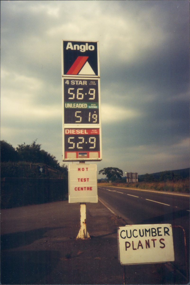 Day 180 of  #petrolstationsCucumber Plants: Anglo, Bridestowe Garage, Devon 1994  https://www.flickr.com/photos/danlockton/16183730770/Bypassed the year before by a new bit of A30, this must've pretty rapidly gone from a viable business, especially in summer, to a quiet backwater. Cucumbers didn't save it.