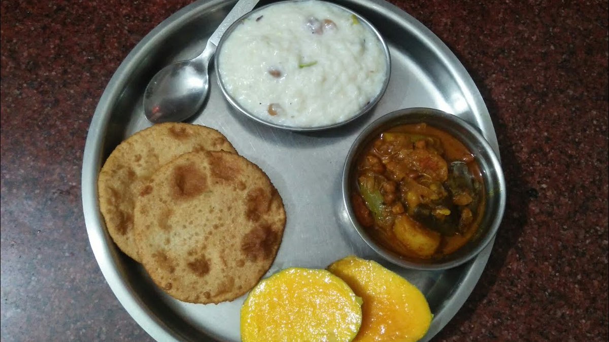 More Bihari food: Khichdi (spicey, not bland; eaten with dahi, papad, ghee, pickles, mashed potatoes )Dahi-churaa-gud (hassle free, wholesome, oil free)Kachori-aloo bhujia: unhealthy but sooo tasty Kheer-dal poori: generally had in this season, hence mangoes for dessert