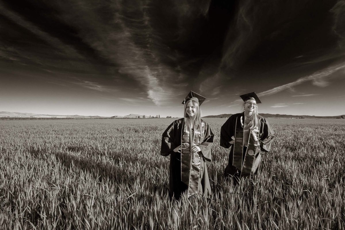 hartung_matt's tweet photo. Portrait of our daughter Kaitlin and her friend Ellie Kaiser in a Tulelake wheat field. Photo by my brother David Hartung. See more of my brother's extraordinary images at https://t.co/zLcM9HQ2zZ 
#CalPolyGrad @km_hartung https://t.co/m1Z0cixaYH