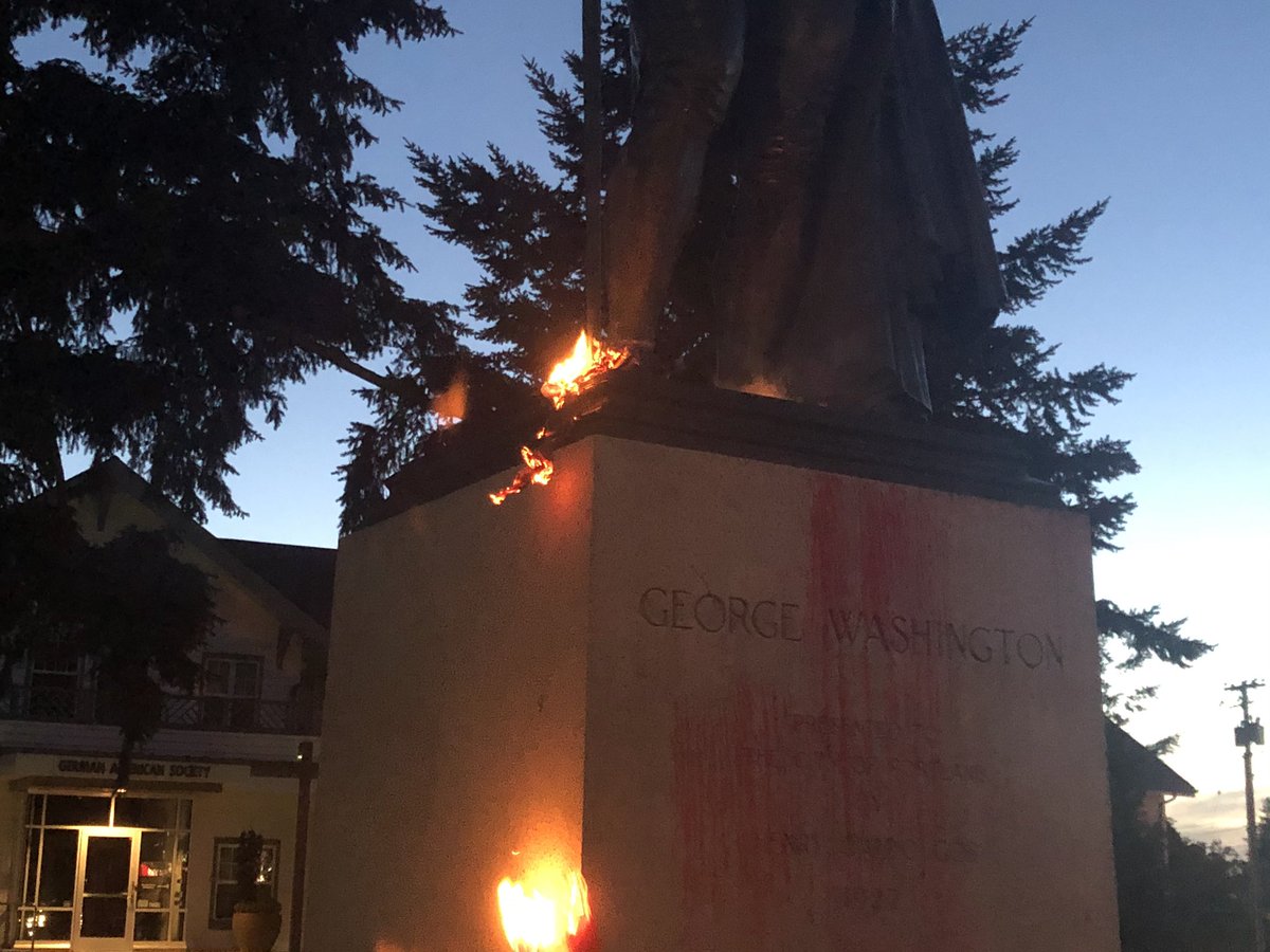 About 50 people here, parts of the George Washington statue now read “Genocidal Colonist” “ACAB” “No Rest Till Abolition” “Slave Owner” (picture from an hour ago) Portlandprotest  #statue  #blacklivesmatter     #PDXprotests  #pdx  #oregon  #blm  #acab  #pdx  #georgewashington  #flagburning