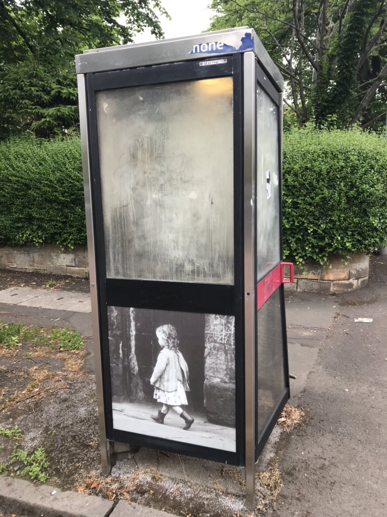 #MomentsofBeauty in #Glasgow: A 1980s BT phone box, banal, vandalised and unloved but look closely and you’ll see two Oscar Marzaroli photographs of the boys in high heels and a girl in a close which someone has installed in the base = a lovely blink and you miss it gesture🥰!