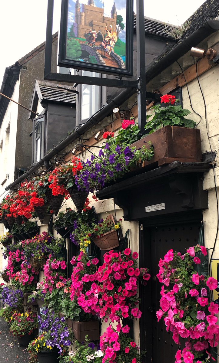 A damp evening stroll around #Bridgnorth lit up by The Old Castle’s hanging baskets