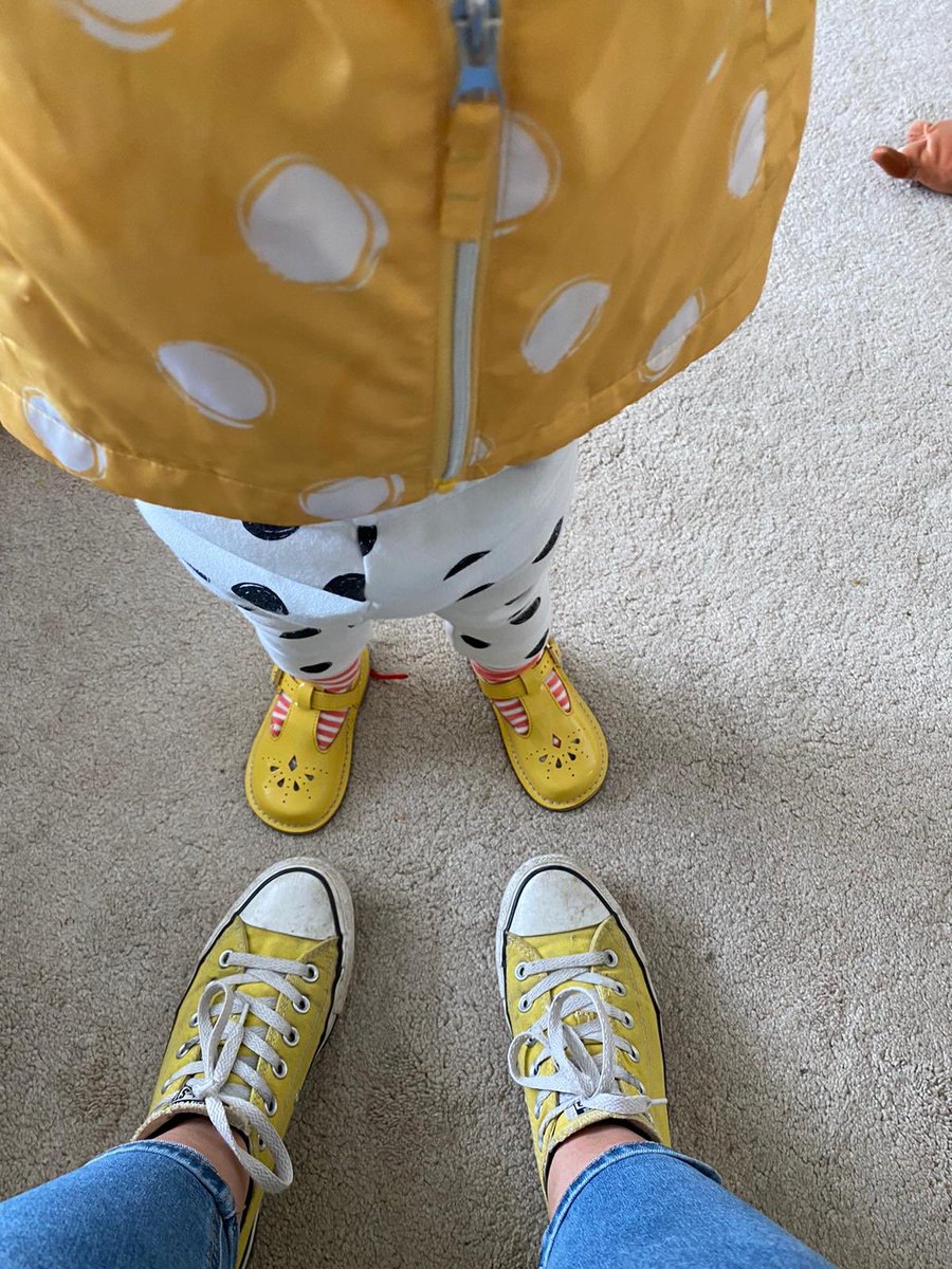 My little one and my wife wearing yellow for CF day