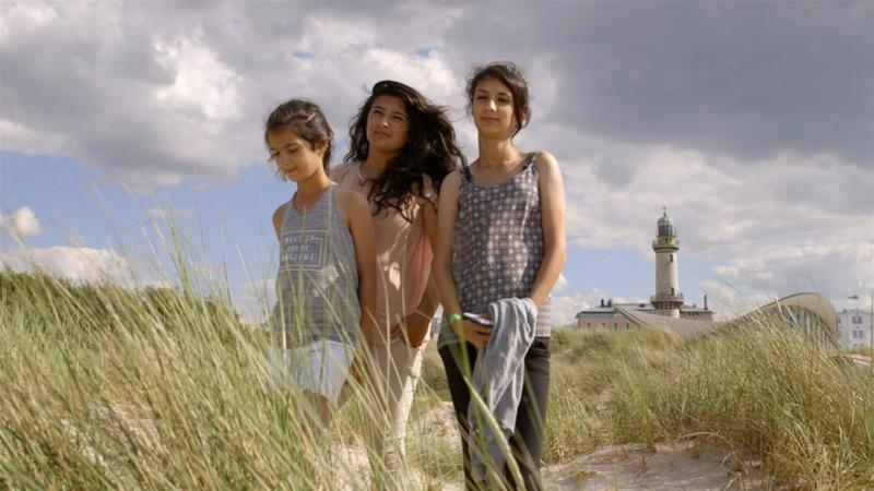 RefugeeWeek's tweet photo. Our #MovingWorlds film of the day is Sky and Ground, which journeys with the Nabi family from a Greek refugee camp across Europe to Berlin. Join director @talyat for a live Q&amp;A on our Facebook page at 3pm, and watch for free until Sunday: https://t.co/Ed5Lj0x7bI #SimpleActs https://t.co/8ThlMOODVk