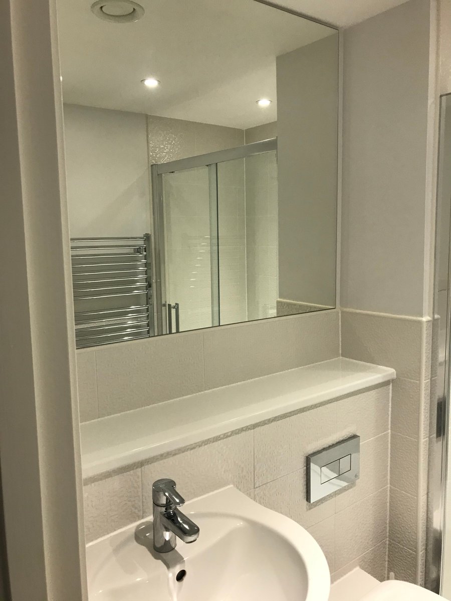 Custom made mirror supplied and fitted - functionality, creating light and a spacious feel
#bathroommirrors #mirrorssouthampton #southamptonglass