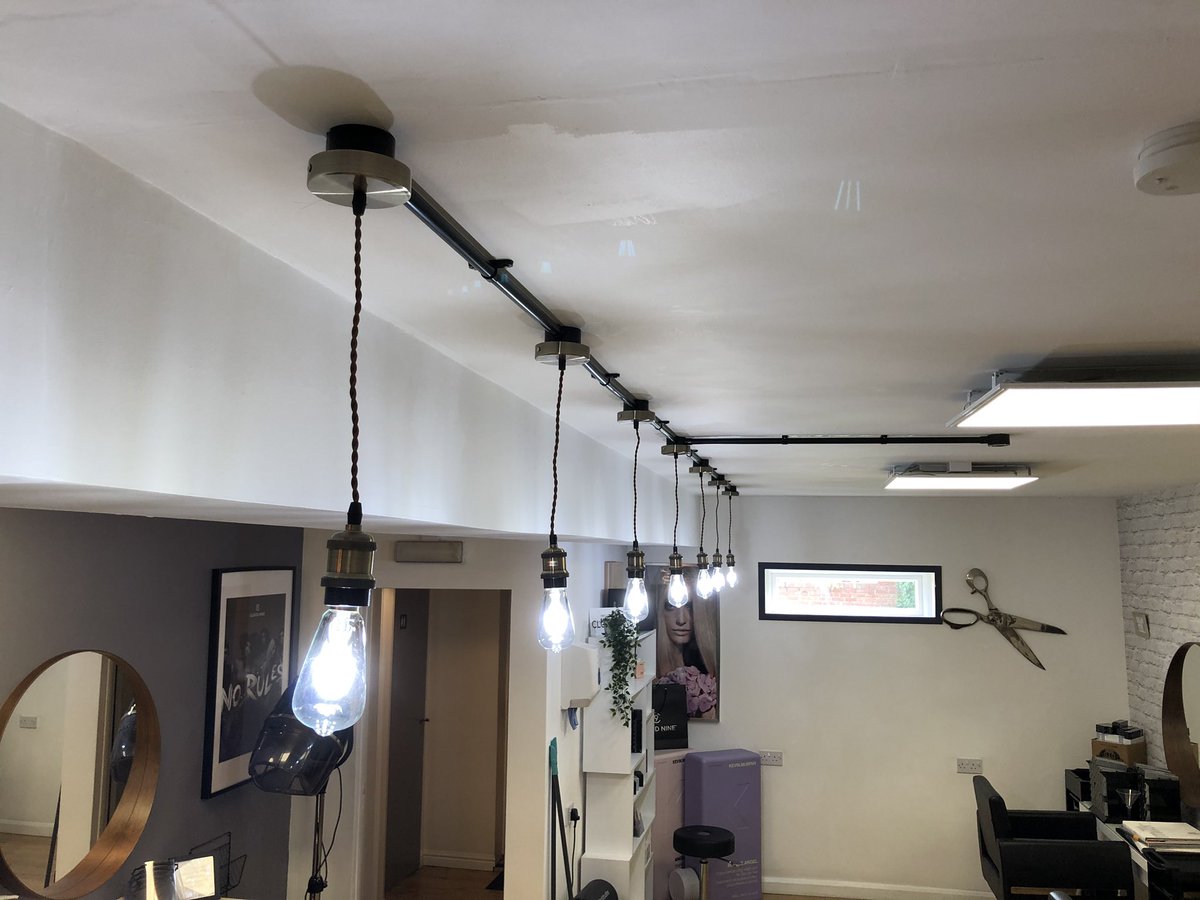 epwengineering's tweet photo. With hair salons getting ready for reopening in early July, I’ve spent the day at NV in Exeter giving their lighting a little refresh. With two new runs of PVC conduit and some lovely LED lamps, it’s a massive improvement over the old lighting. https://t.co/H6IFBk6MsD