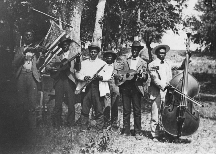 Juneteenth celebration (ca. 1900). "We shall demonstrate once again that in this great, inventive land man’s idlest dreams are but the blueprints and mockups of emerging realities, technologies and poems." - Ralph Ellison, _Juneteenth_