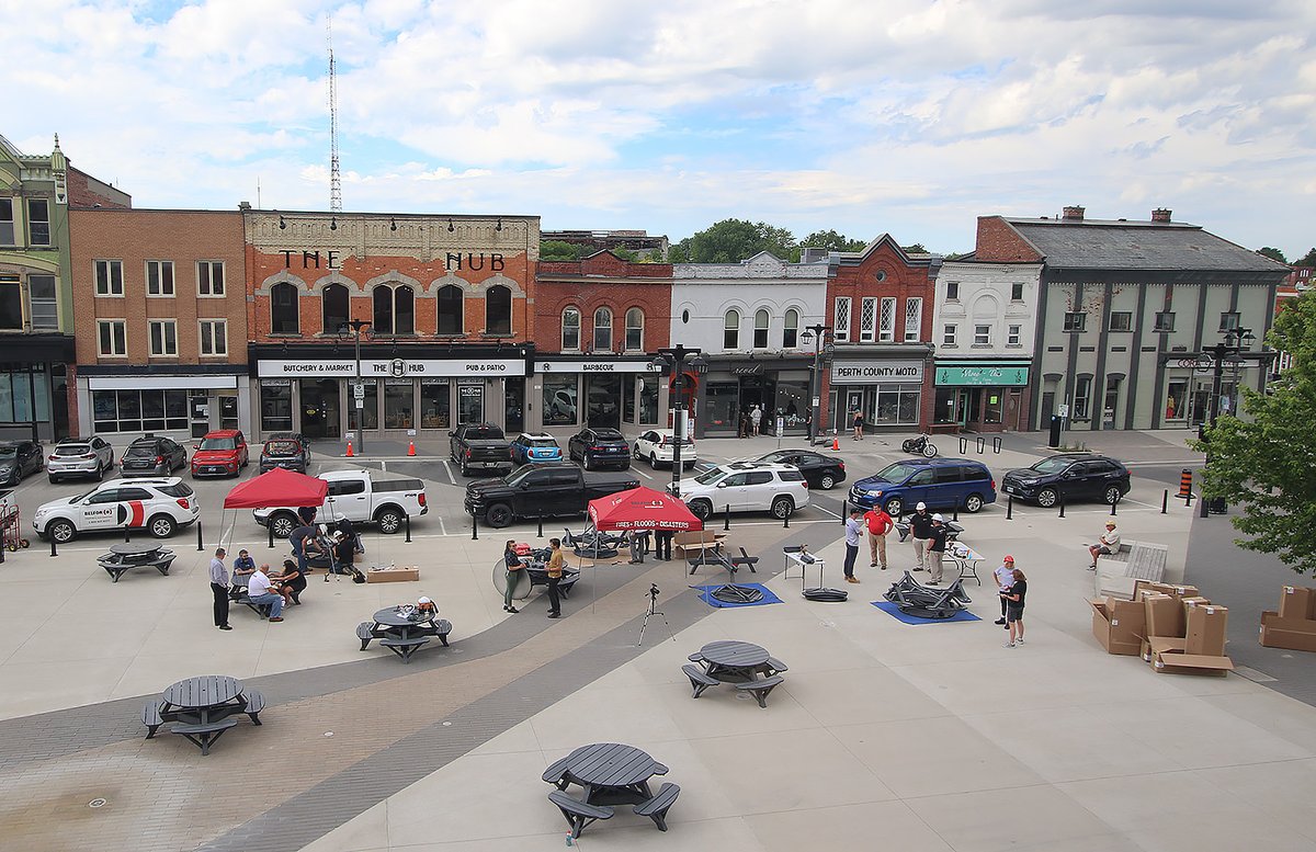 cityofstratford's tweet photo. The first batch of tables have been installed in Stratford's Market Square as part of the Al Fresco Outdoor Dining Project to support local restaurants and food services. The project is spearheaded by the Stratford Economic Response and Recovery Task Force. https://t.co/QZG5z76bir