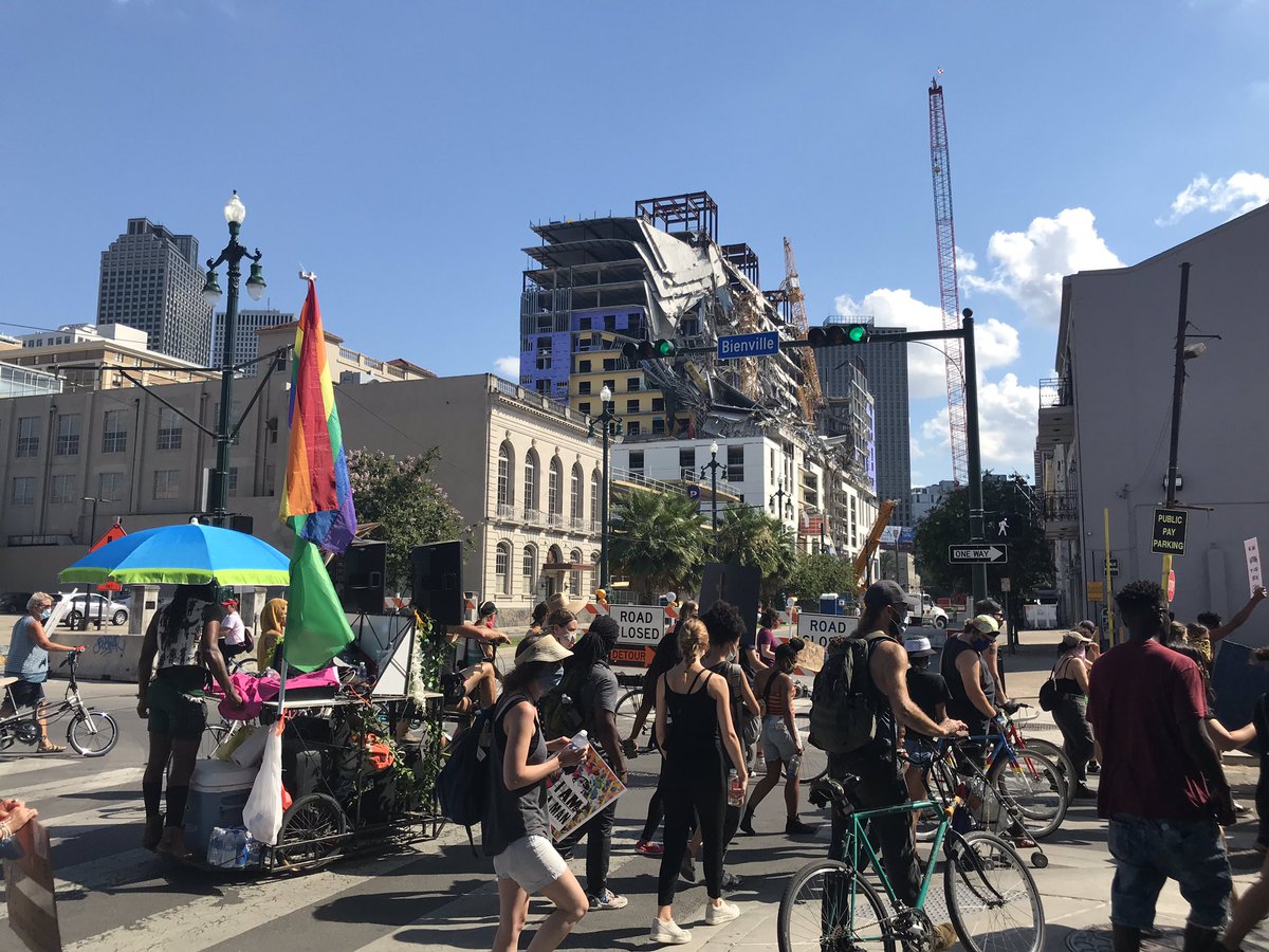 Detouring around the Hard Rock Hotel collapse site, which has kept several surrounding blocks closed since the fatal disaster in October.
