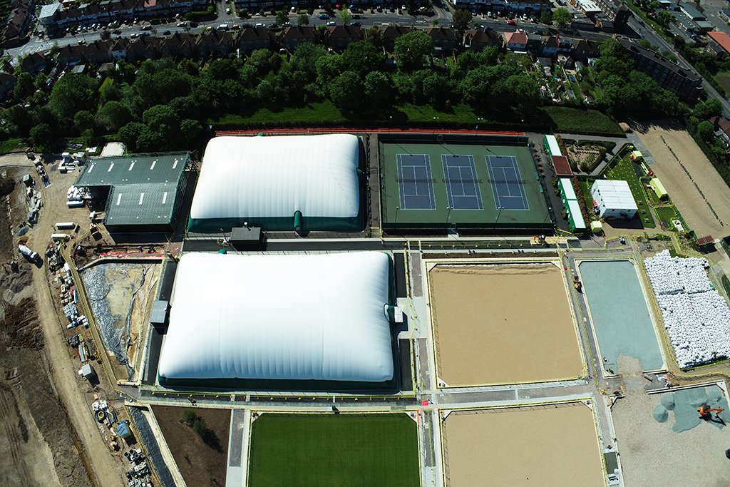 SCSlatter's tweet photo. With Phase I complete, we're thrilled to be moving onto Phase II at the AELTC's Community Sports Ground, where we're constructing 3x new Plexipave under-dome #tenniscourts in addition to supporting pathways and roadways: https://t.co/a3onfkD2rJ

#sportsconstruction #surfacing https://t.co/WAe6CQ9f4Y