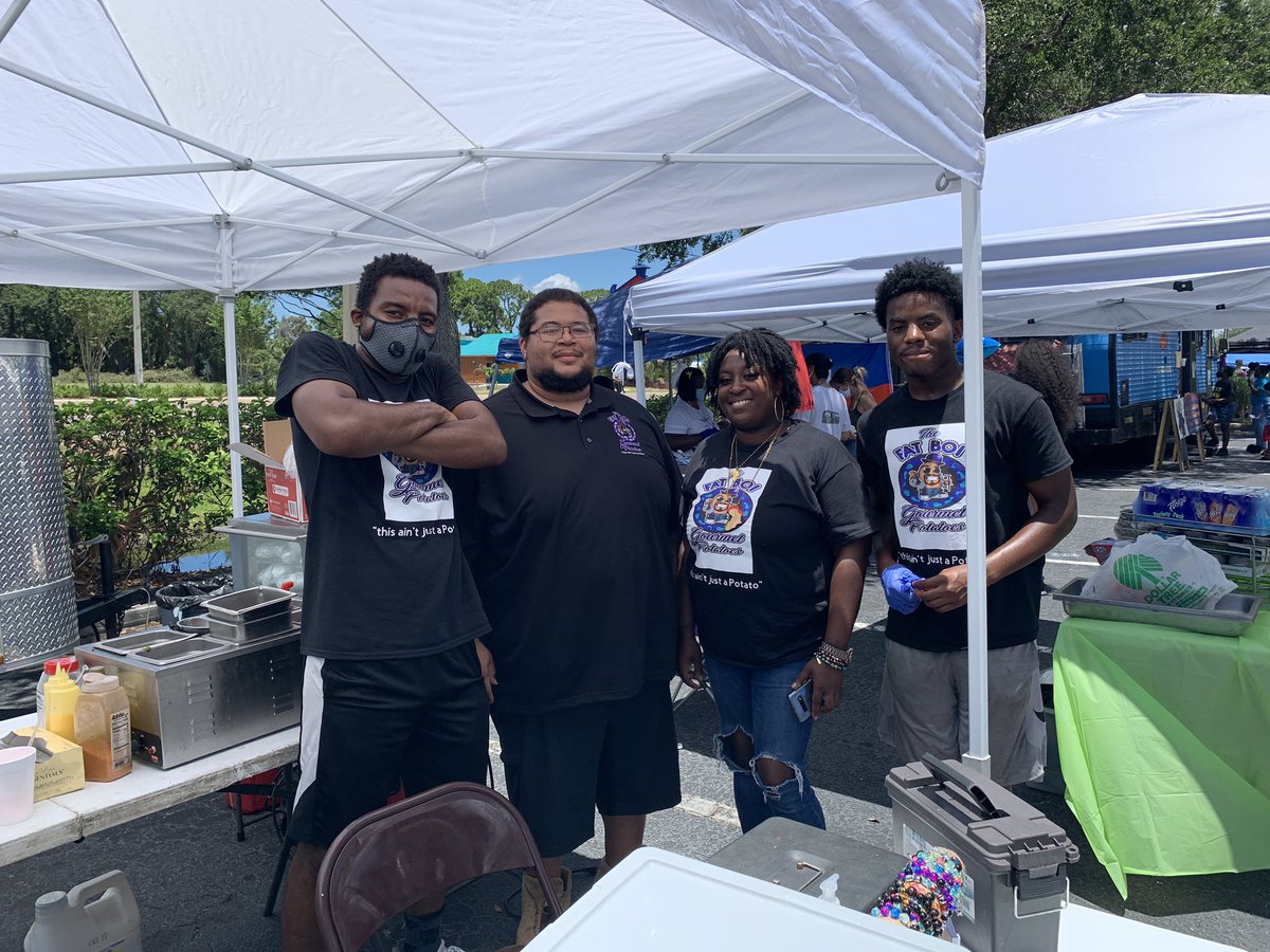 Josh Wiley, owner of <a href="/Fatboipotatoes/">Fat Boi Gourmet Potatoes</a>, (2nd from the left) started his business abt 3 years ago. He grew up celebrating Juneteenth and said he hopes today’s event will help minority-owned small businesses grow. “It’s beautiful,” he said. “It’s nice to see everybody come together”