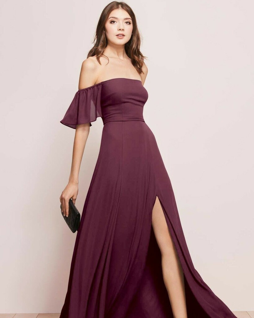 Show-off-your-shoulders neckline? Check. Flirty, floaty sleeves? Check. Thigh-high slit? Check. Basically, the floor-length Baylie #bridesmaidsdress from <a href="/watters/">Cameron Watters</a> has got it all! 😍😍 #modernbride #coolbride #ukwedding #bride #wedding #bridetobe #love … instagr.am/p/CBoKZb9oqvd/