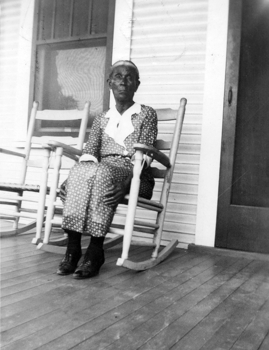 TracesofTexas's tweet photo. Former slave Adeline Cunningham on her porch in San Antonio, 1937. She was freed by General Order #3 on June 19, 1865. https://t.co/FRqH9hsAcd