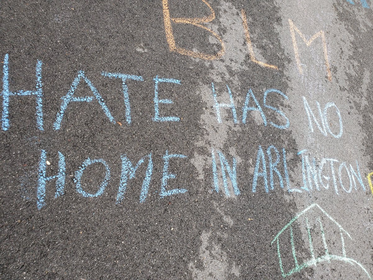 "Hate has no home in Arlington" appeared more than once, here's just a few: (The picture next to it as a logo of sorts for the county)