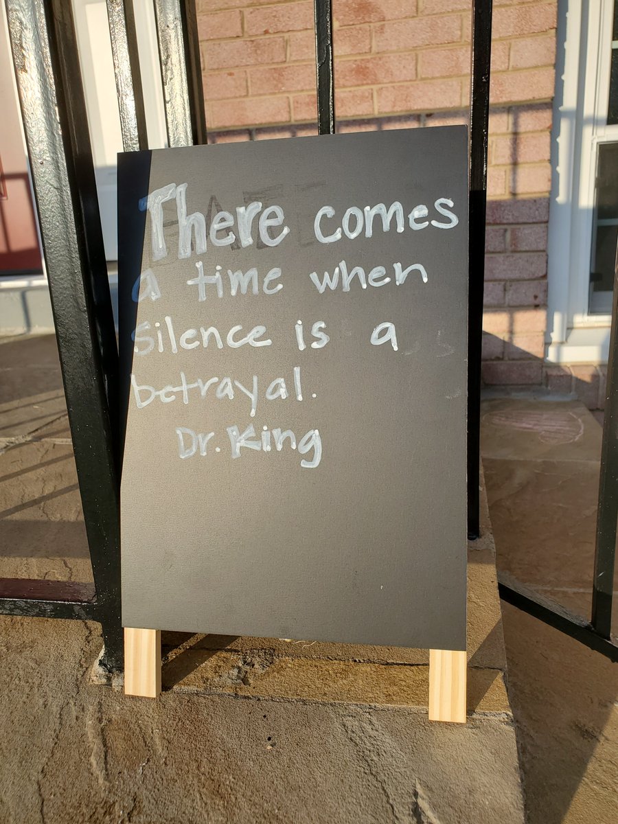 These signs are in the yard of the house in question. I'm assuming neighbors made them all but I'm not sure.These either from just in front of their yard or their front steps